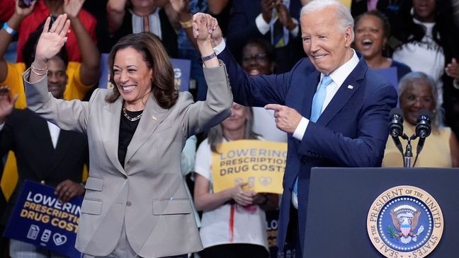 President Joe Biden and Vice President Kamala Harris finish speaking about their administration's efforts to lower prescription drug costs during an event at Prince George's Community College in Largo, Md., Thursday, Aug. 15, 2024. (AP Photo/Stephanie Scarbrough)