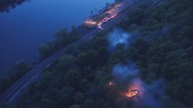 The scene of a wildfire where a firefighter was injured Thursday evening near Poca. He has since been released from the hospital.{&nbsp;} (WCHS){p}{/p}