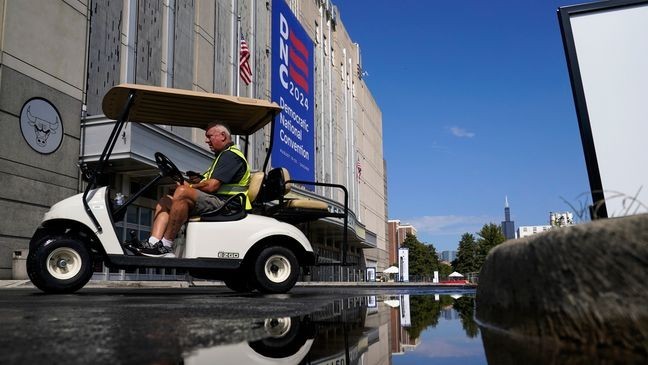 Workers prepare for the Democratic National Convention at United Center, Saturday, Aug. 17, 2024, in Chicago. (AP Photo/Kiichiro Sato)