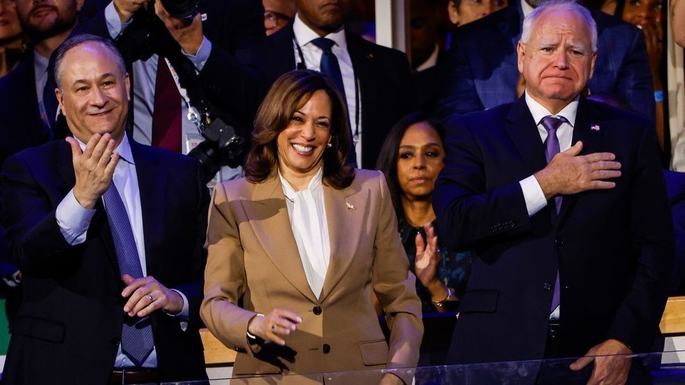 CHICAGO, ILLINOIS - AUGUST 19: (L-R) Second Gentleman Doug Emhoff, Democratic presidential candidate, U.S. Vice President Kamala Harris, and Democratic vice presidential candidate Minnesota Gov. Tim Walz  attend the first day of the Democratic National Convention at the United Center on August 19, 2024 in Chicago, Illinois.  Delegates, politicians, and Democratic party supporters are in Chicago for the convention, concluding with current Vice President Kamala Harris accepting her party's presidential nomination. The DNC takes place from August 19-22. (Photo by Kevin Dietsch/Getty Images)