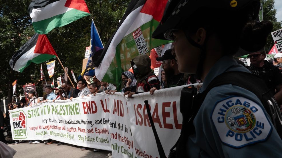 CHICAGO, ILLINOIS - AUGUST 19: Demonstrators march near the United Center which is hosting the Democratic National Convention (DNC) on August 19, 2024 in Chicago, Illinois. The convention runs through August 22. (Photo by Scott Olson/Getty Images)