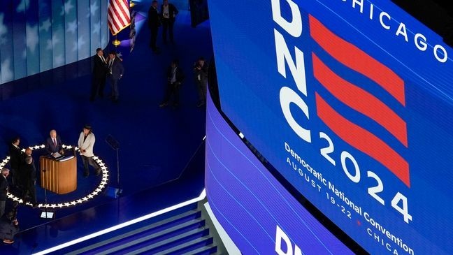 President Biden looks over the hall before the Democratic National Convention Monday, Aug. 19, 2024, in Chicago. (AP Photo/James Lipari)